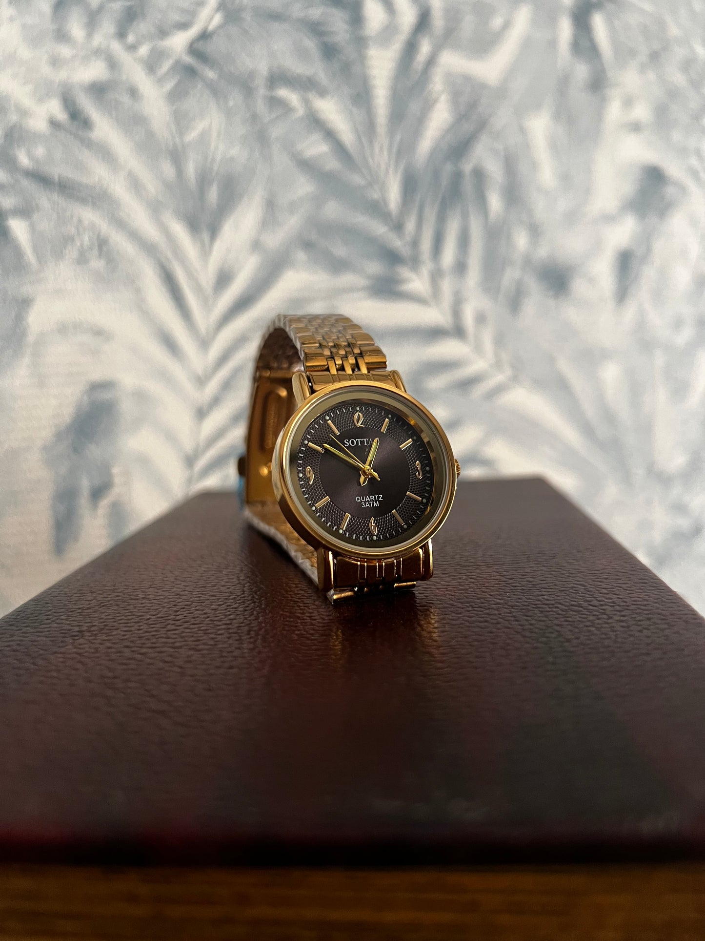 Sottas black dial watch