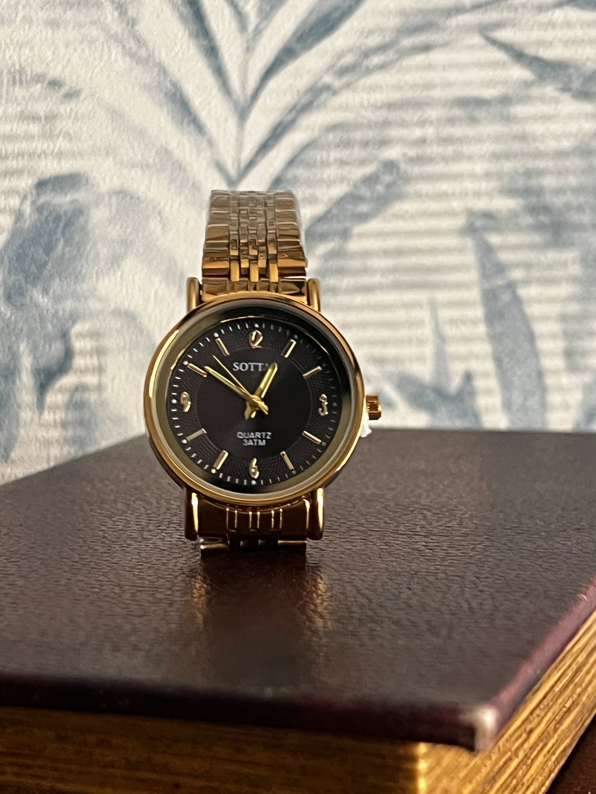 Sottas black dial watch