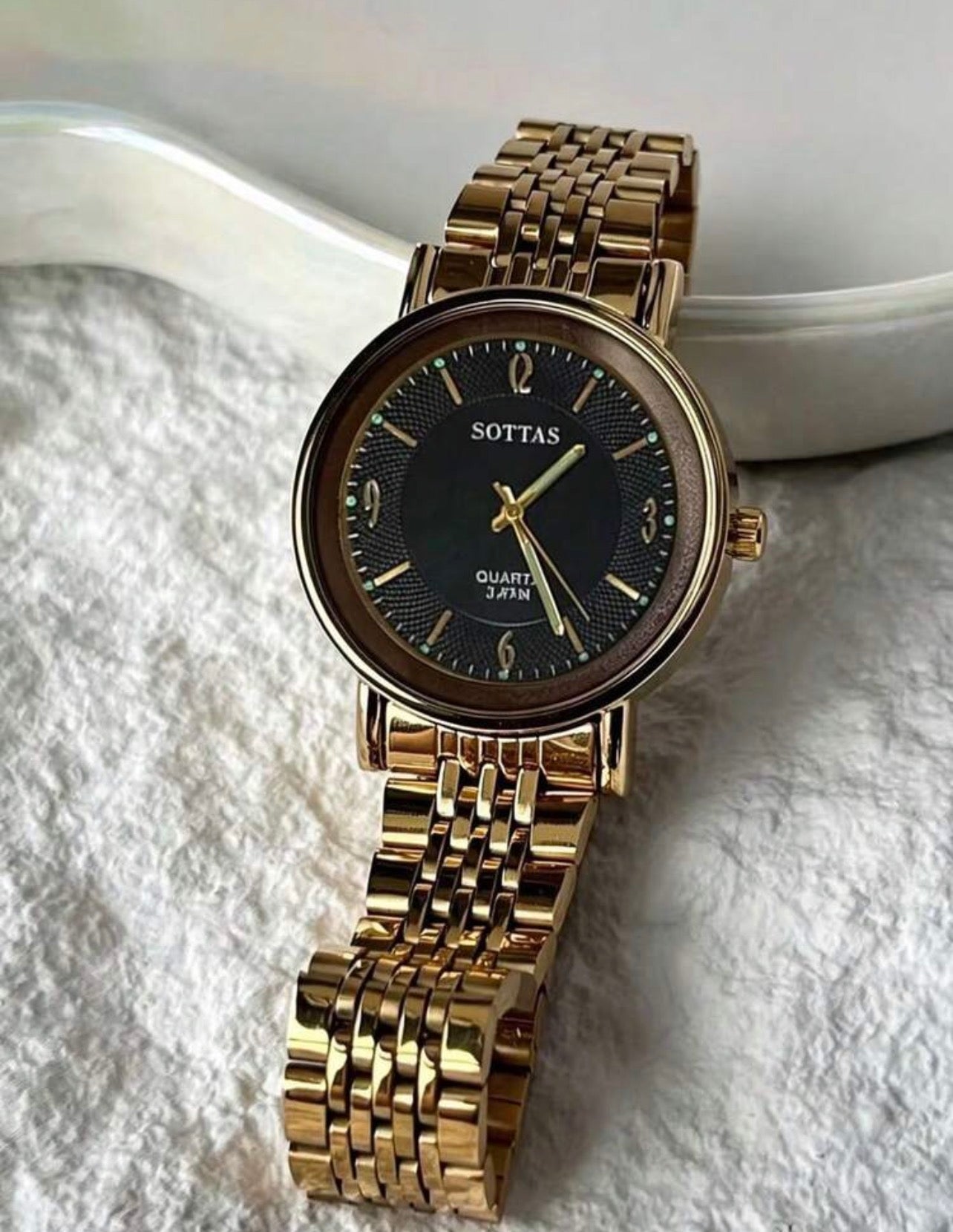 Sottas black dial watch